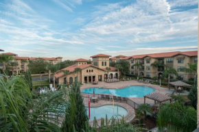 Ground floor condo, no carpet, close to community pools, fitness room, 9 miles to Disney World